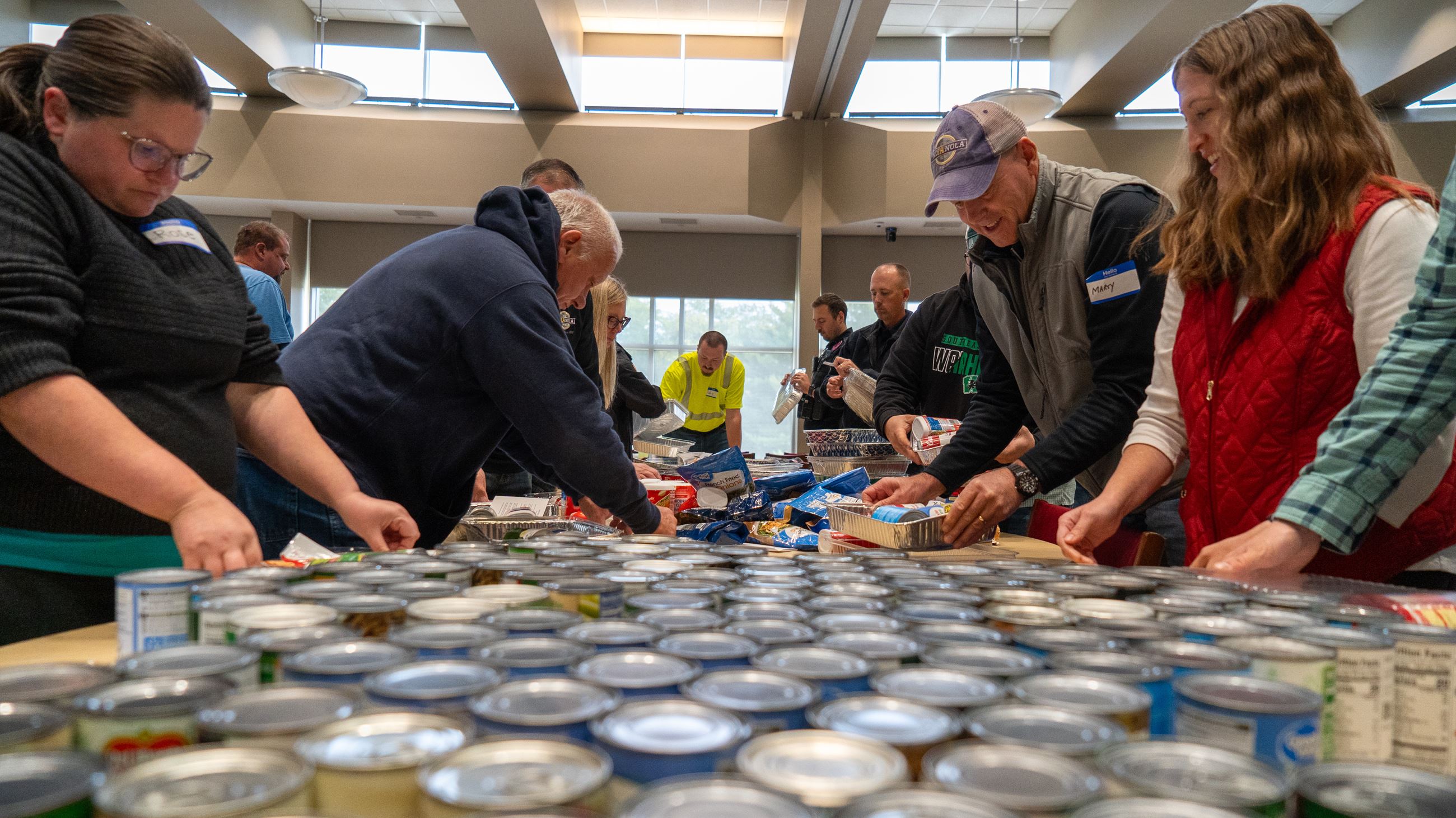 City of Indianola employees assemble kits for the Neighbor-to-Neighbor Community Donation Drive.
