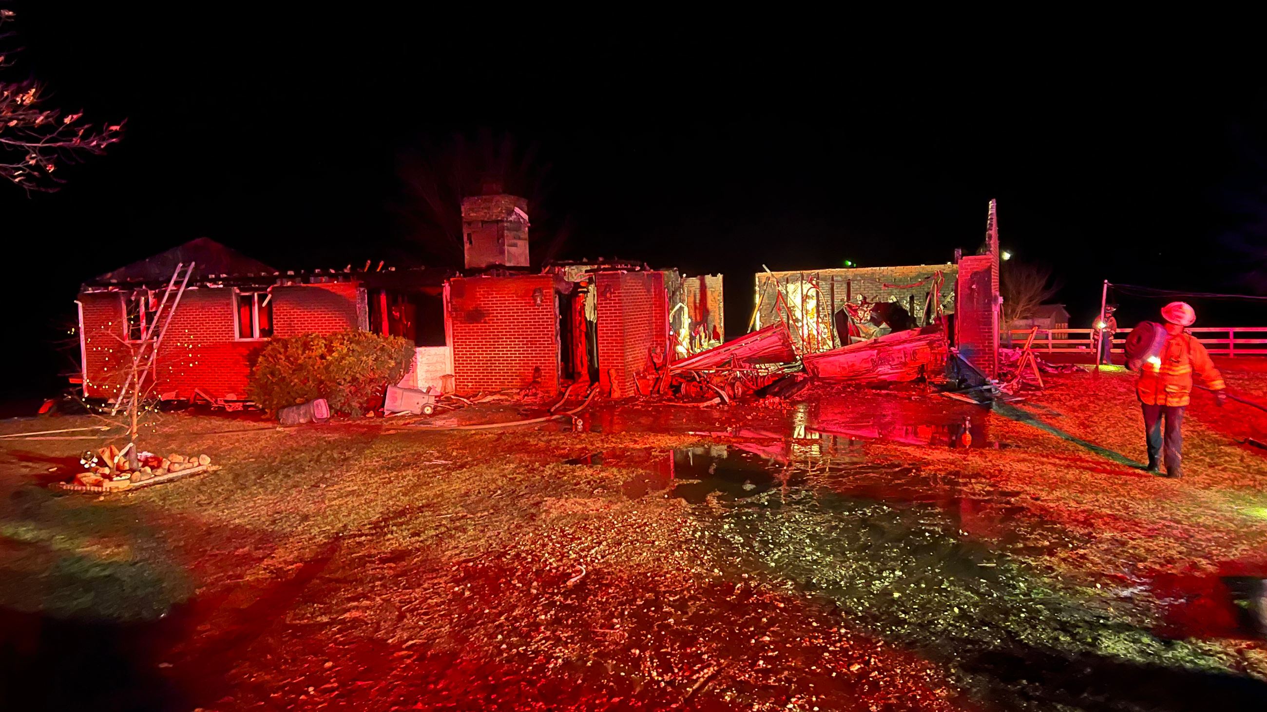 Indianola Fire Crews work to extinguish a fire at a residence during the early morning.