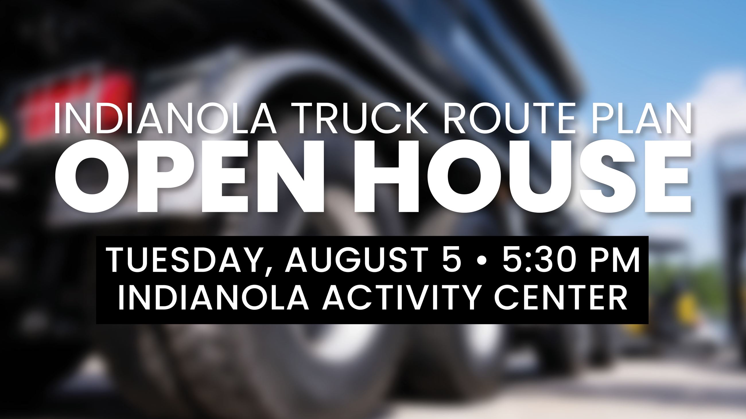 A blurred of a semi truck tire promoting an open house event on Tuesday, August 5, 2025. 