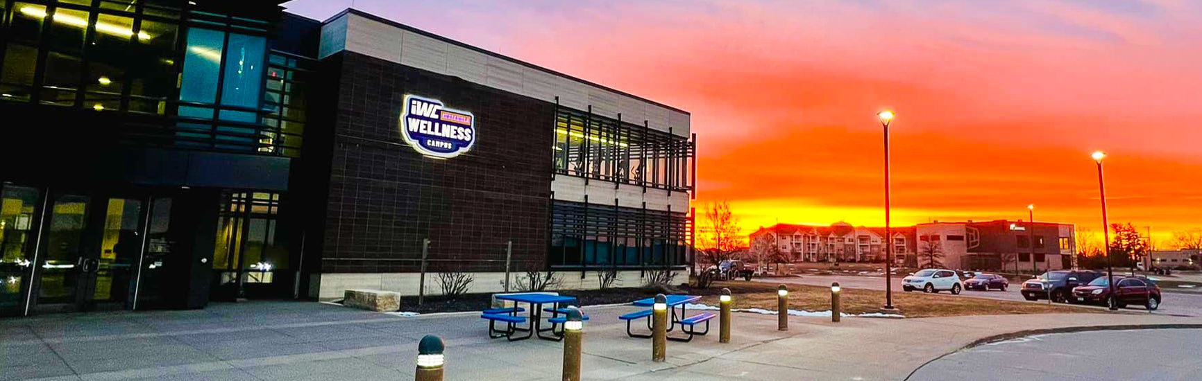 Exterior of the Indianola Wellness Campus building's front entrance sign.