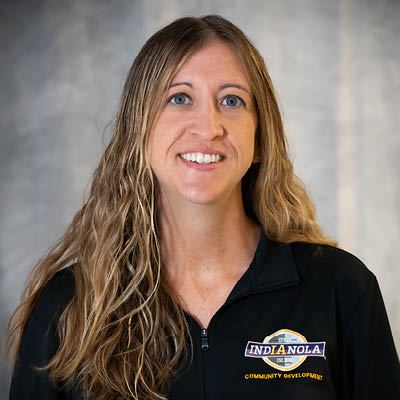 Office Assistant Tara Bosteder smiles for a portrait photo.