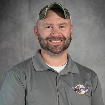 Building & Zoning Official Tim Little smiles for a portrait photo.