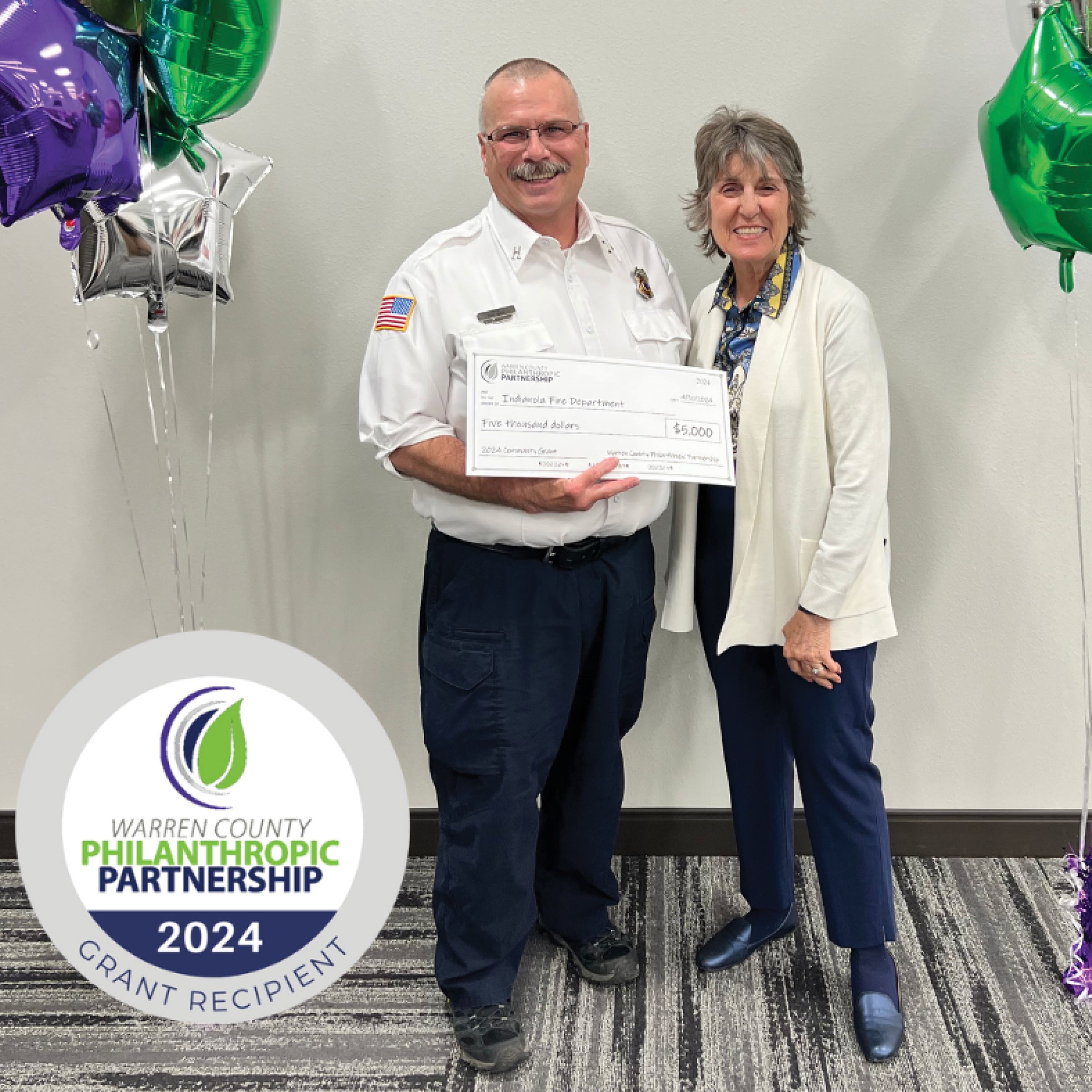 Indianola Fire Captain Thad White receives a $5,000 grant award from WCPP on Tuesday, April 30, 2024