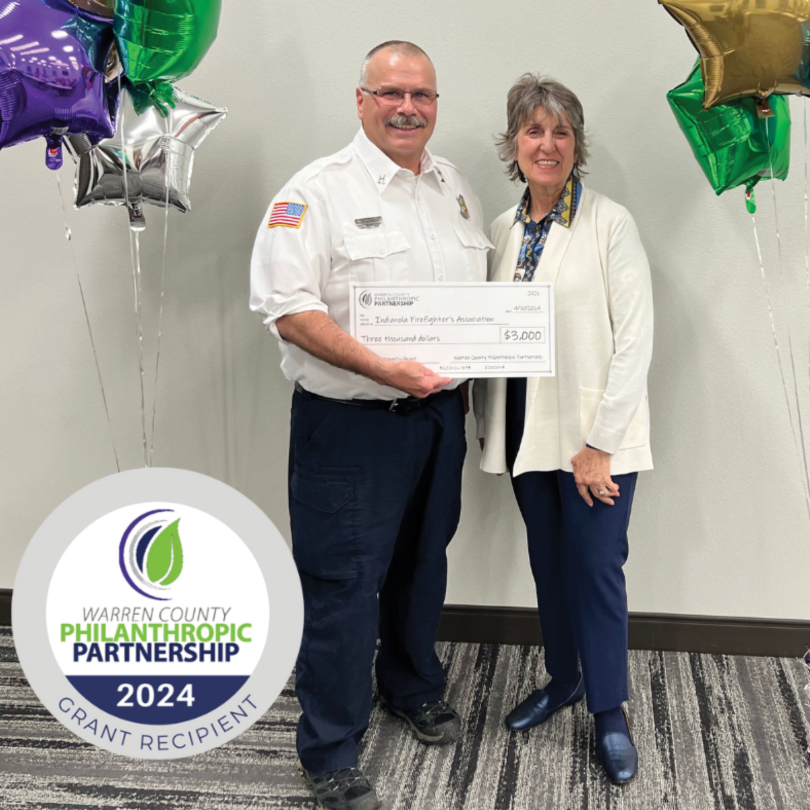 Indianola Fire Captain Thad White receives a $3,000 grant award from WCPP on Tuesday, April 30, 2024